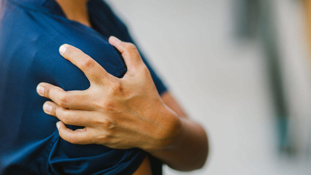 man with shoulder pain